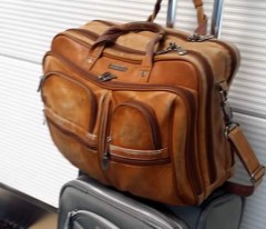 Heritage bag in its typical spot on top of my Delsey carry-on.